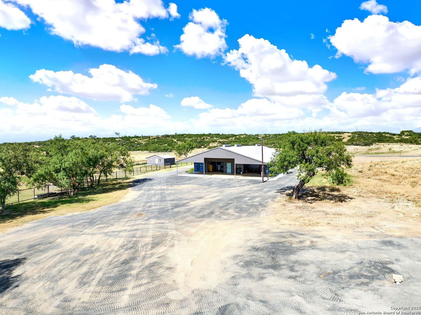 722 County Road 424 Hondo, TX 78861 - Photo 11 of 45 a view of a lake with a big yard