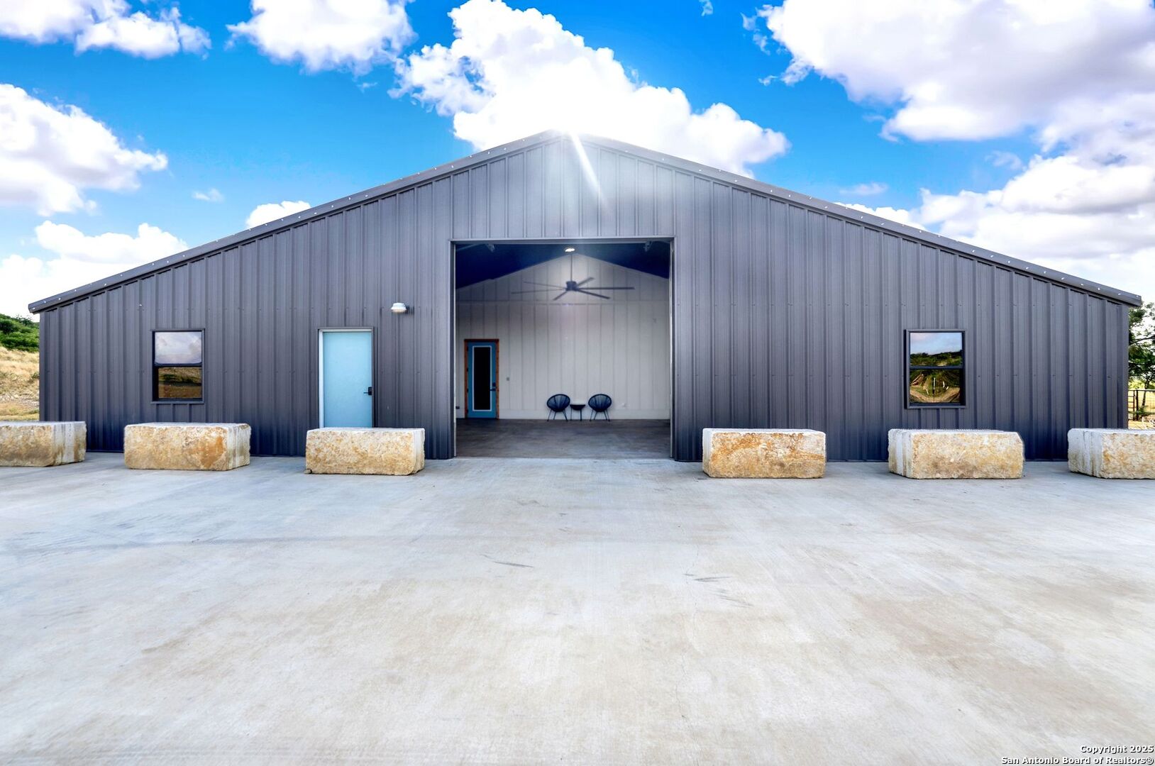 722 County Road 424 Hondo, TX 78861 - Photo 17 of 45 a view of a livingroom with furniture and a flat screen tv