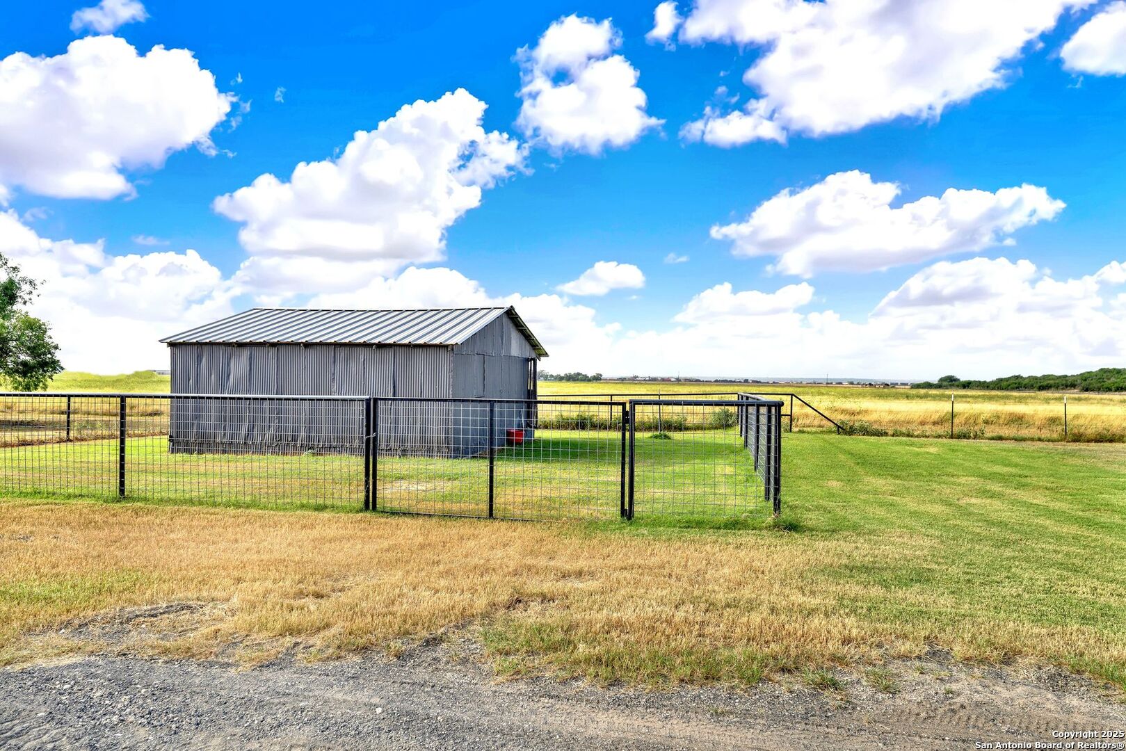 722 County Road 424 Hondo, TX 78861 - Photo 18 of 45 a view of backyard with wooden fence