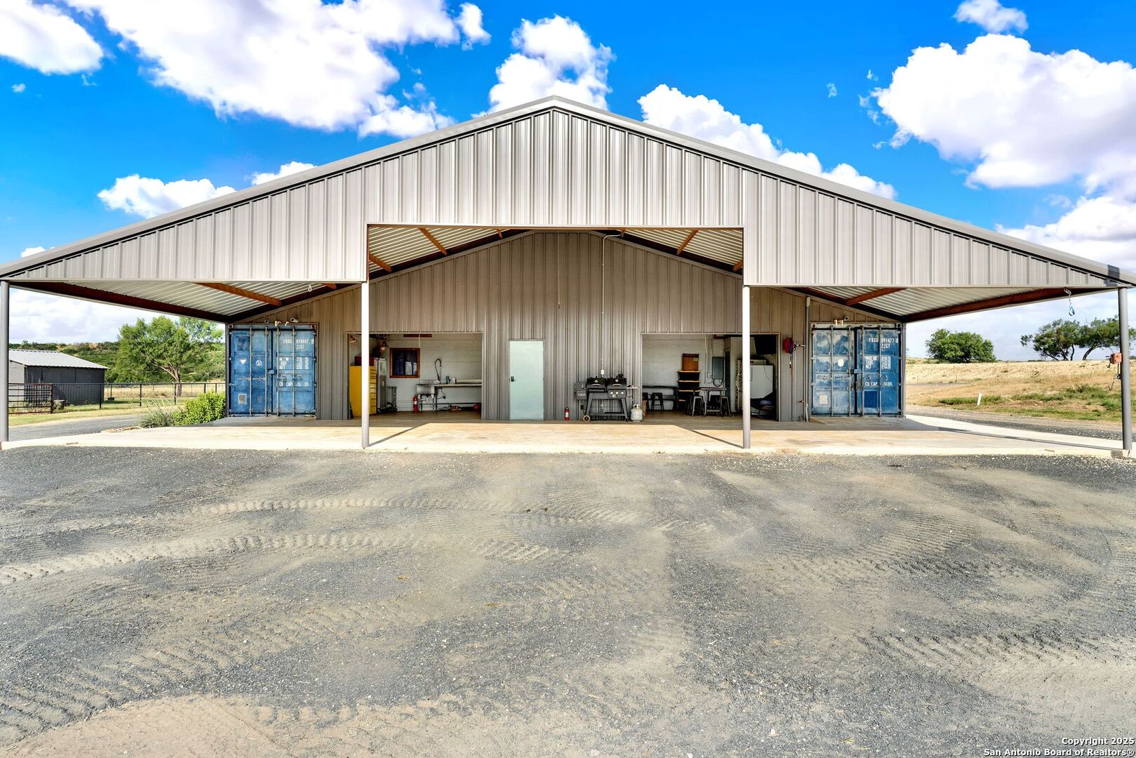 722 County Road 424 Hondo, TX 78861 - Photo 22 of 45 a view of a house with a outdoor space