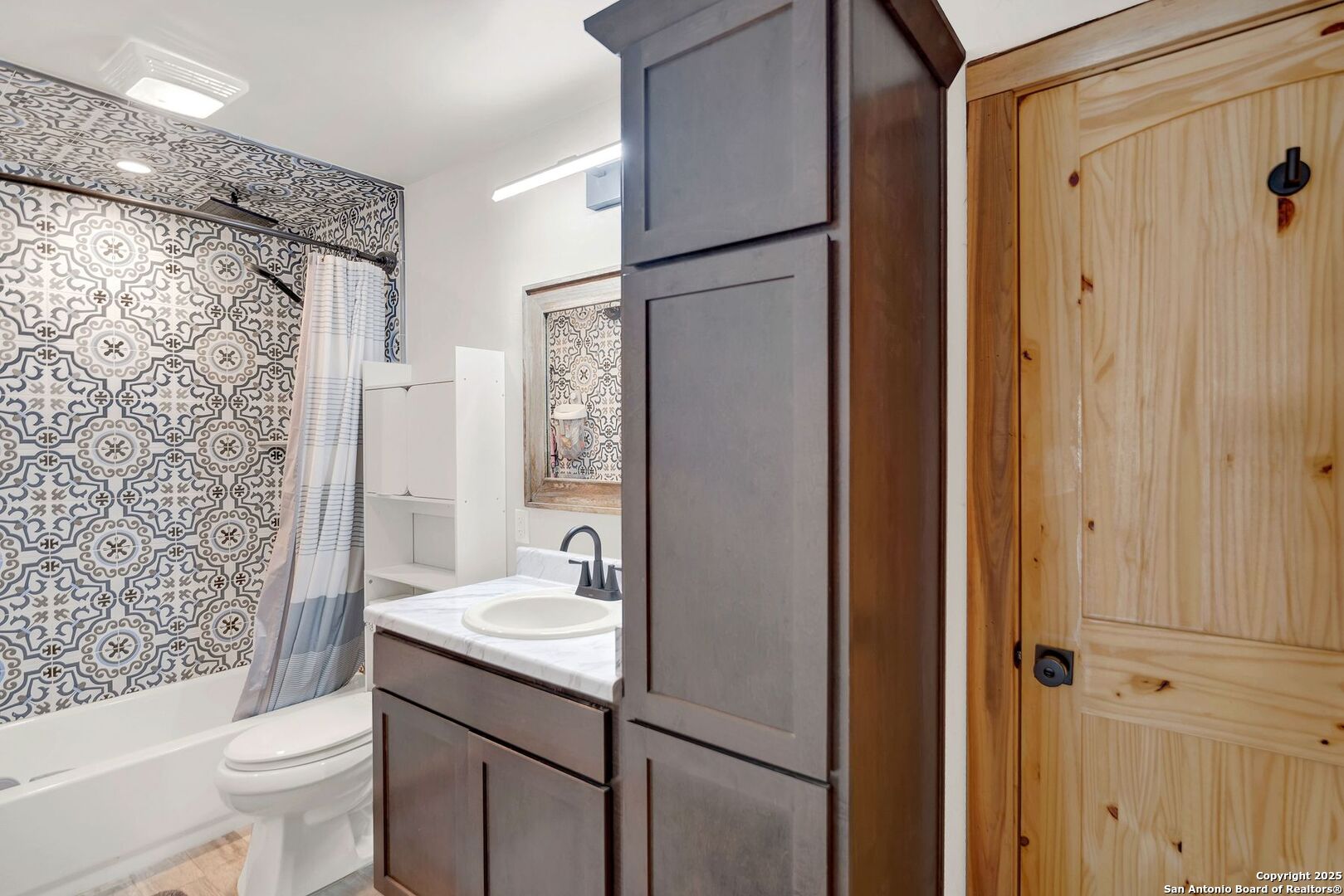 722 County Road 424 Hondo, TX 78861 - Photo 42 of 45 a bathroom with a sink a toilet and shower