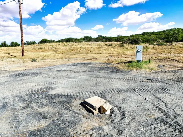 a view of a lake with a big yard
