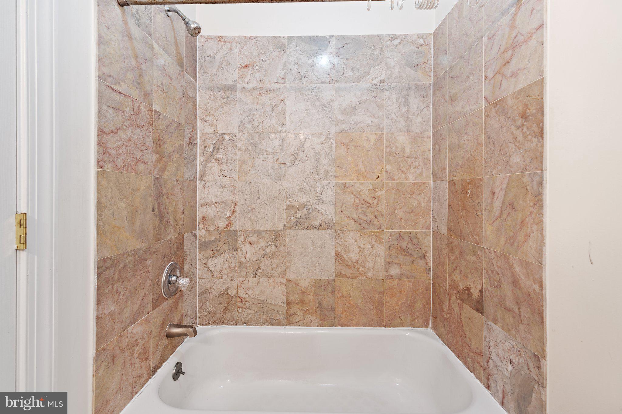 1729 Fontain Street, Unit 1 Philadelphia, PA 19121 - Photo 19 of 25 a bathroom with a bathtub