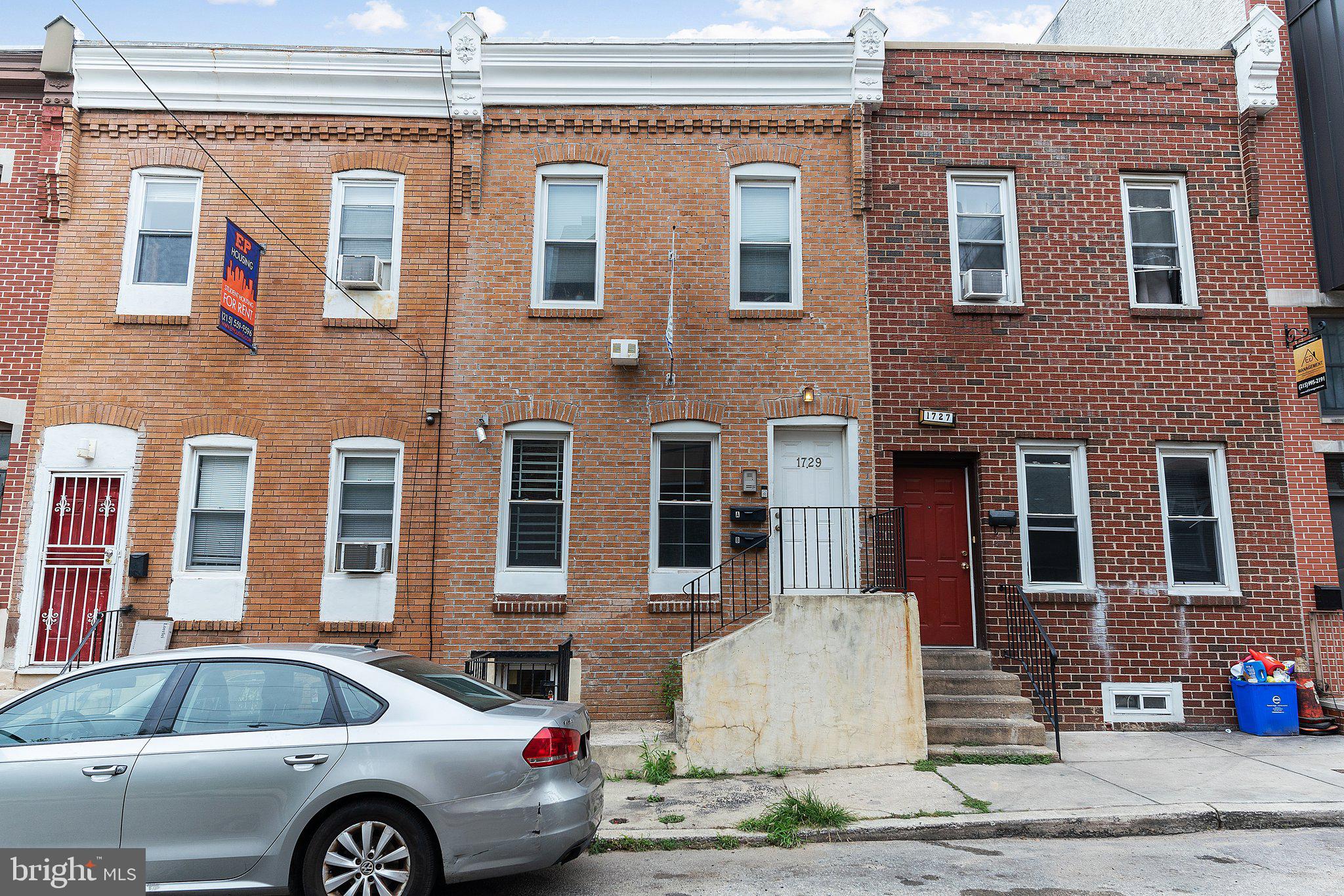 1729 Fontain Street, Unit 1 Philadelphia, PA 19121 - Photo 24 of 25 a front view of a house with a outdoor space