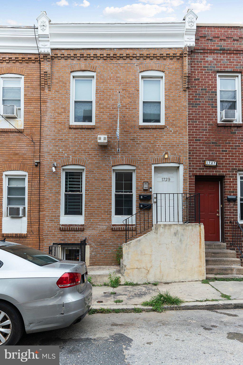 1729 Fontain Street, Unit 1 Philadelphia, PA 19121 - Photo 25 of 25 a front view of a house with a yard