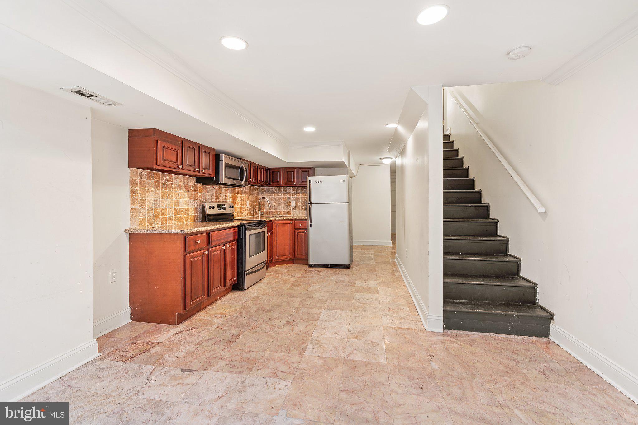 1729 Fontain Street, Unit 1 Philadelphia, PA 19121 - Photo 6 of 25 a view of a kitchen with a sink
