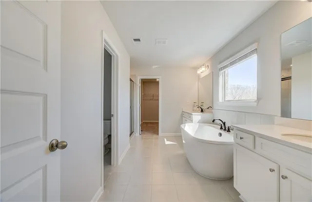 a bathroom with a sink and a bathtub