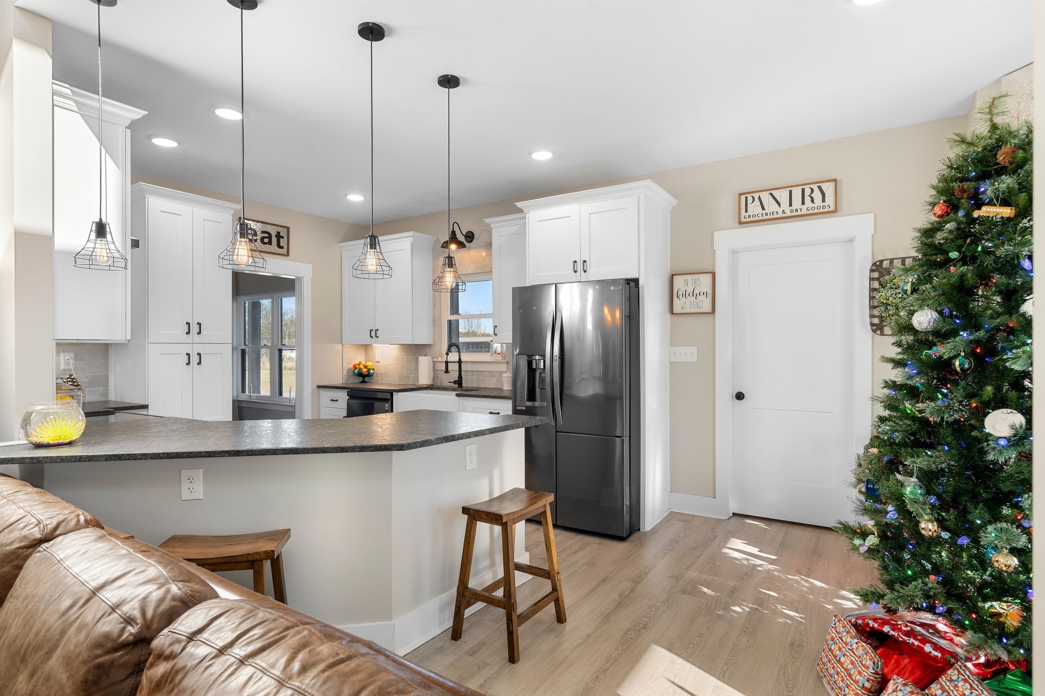 5650 Sledge Road Christiana, TN 37037 - Photo 11 of 50 a kitchen with stainless steel appliances granite countertop a refrigerator a sink and a stove