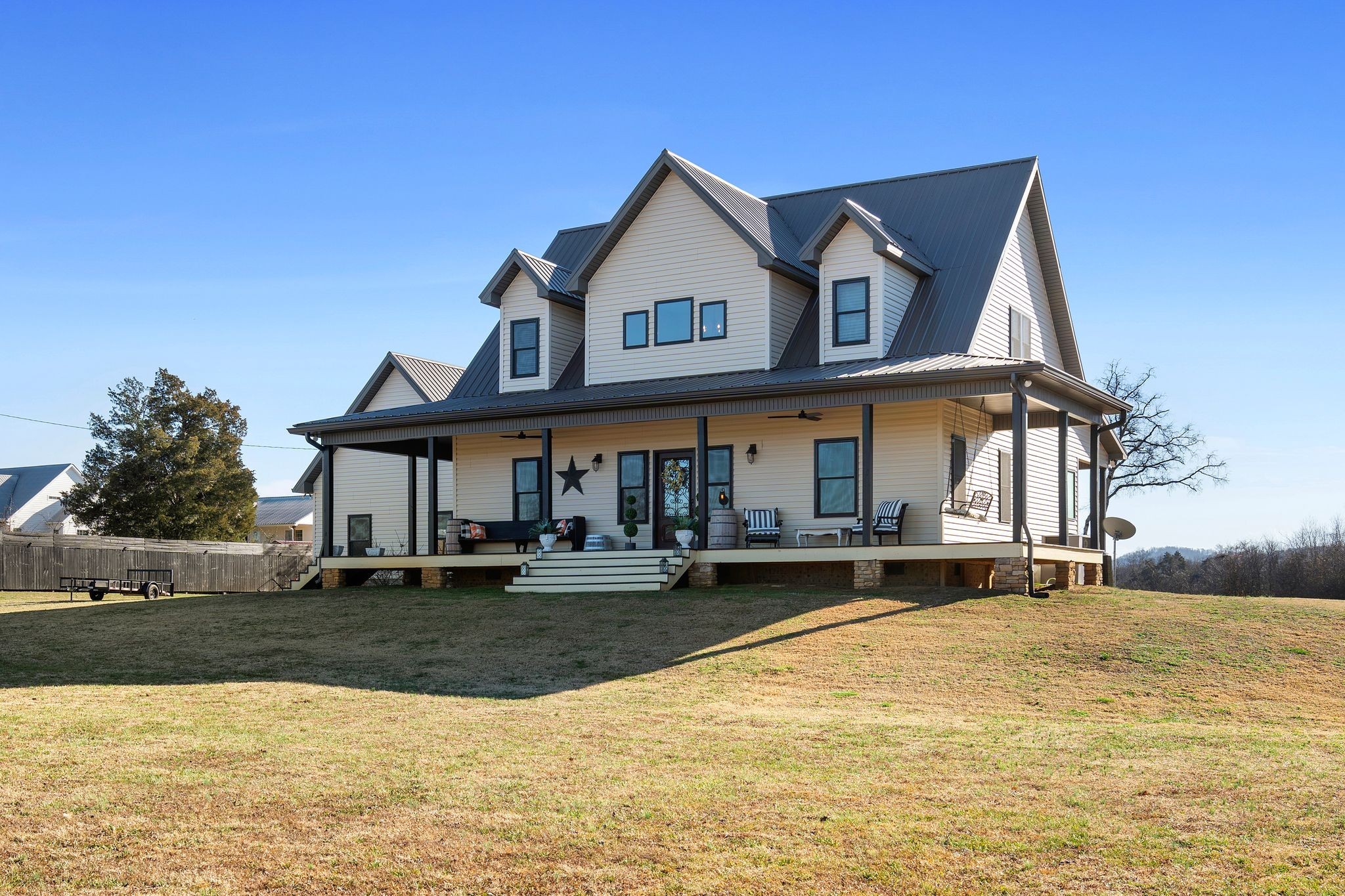 5650 Sledge Road Christiana, TN 37037 - Photo 2 of 50 a front view of a house with a yard