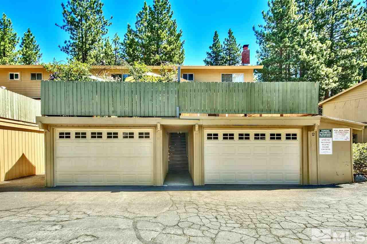 450 Mcfaul Way Zephyr Cove, NV 89448 - Photo 14 of 20 a view of a chairs and table in the back yard of a house