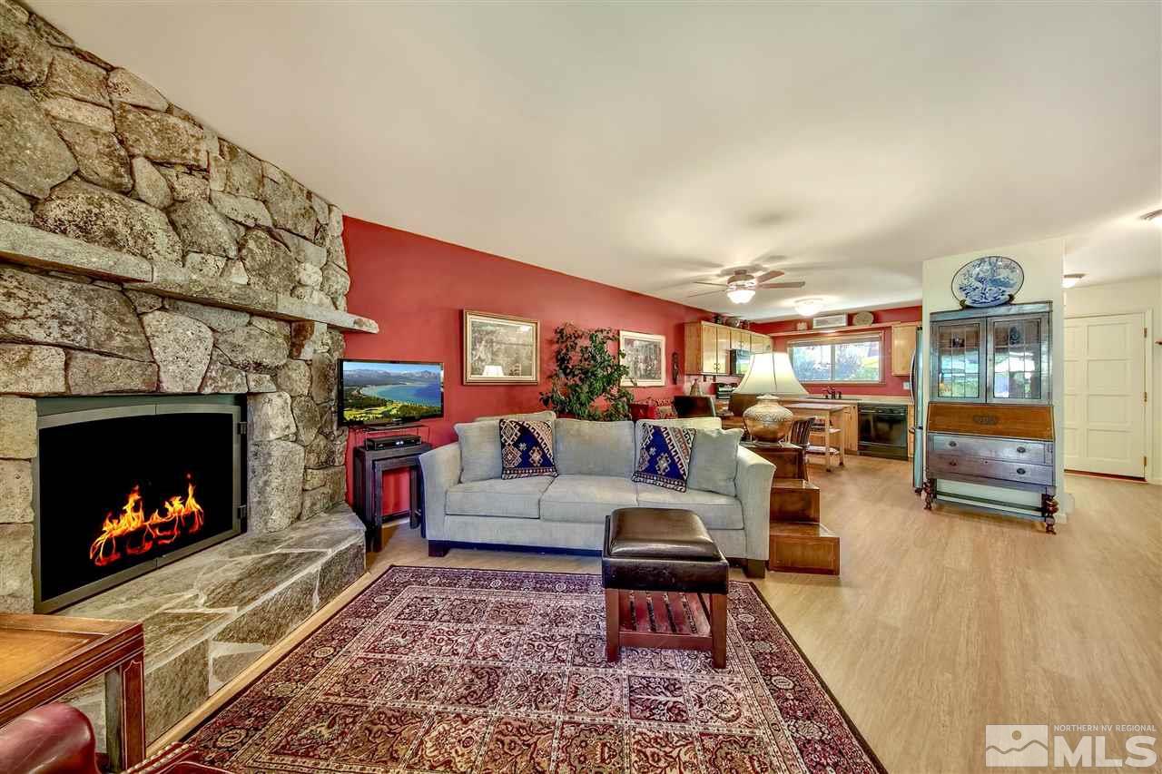 450 Mcfaul Way Zephyr Cove, NV 89448 - Photo 5 of 20 a living room with furniture and a fireplace