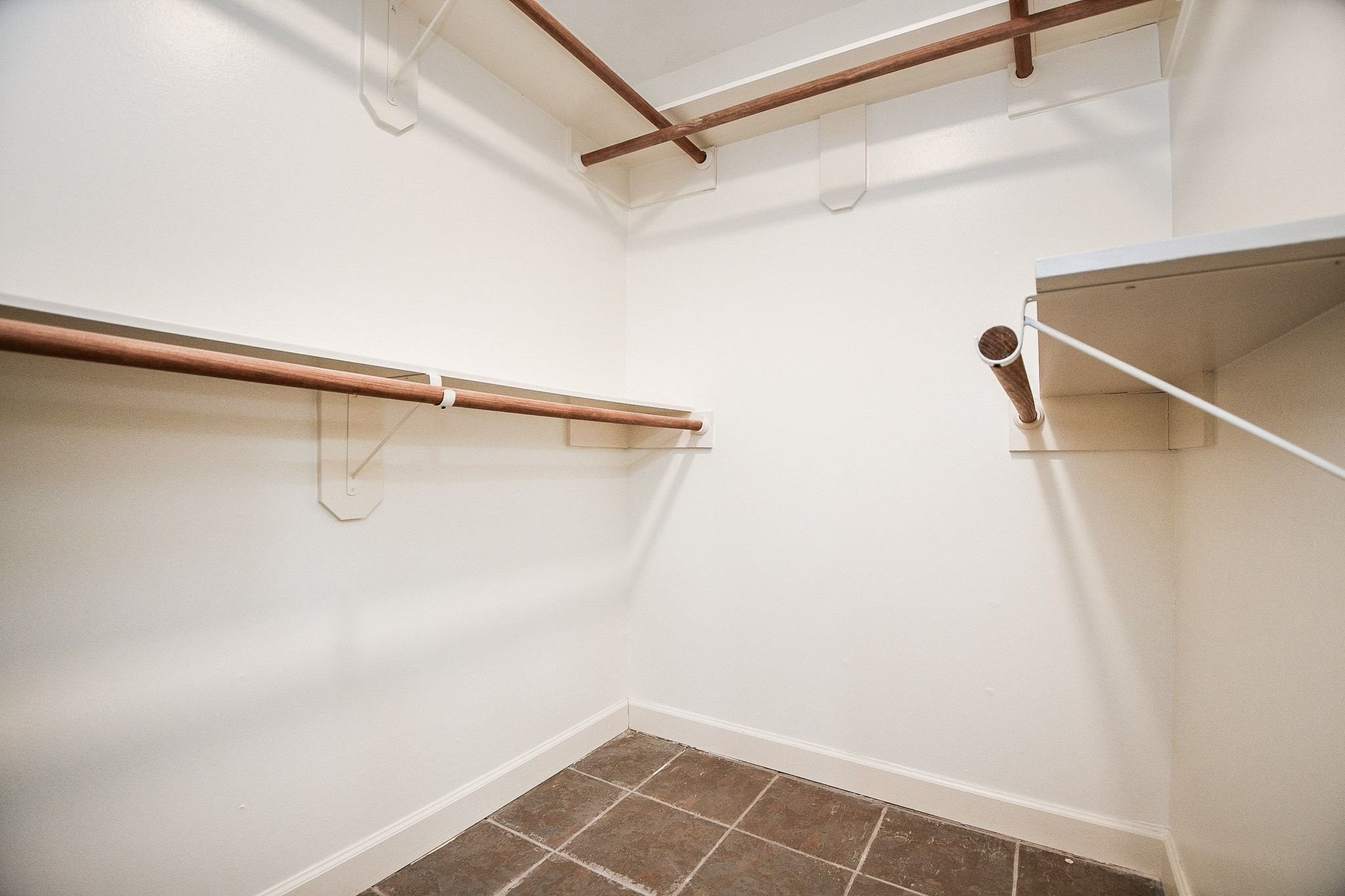 14011 Wickersham Lane Houston, TX 77077 - Photo 25 of 38 Primary bedroom walk-in closet.