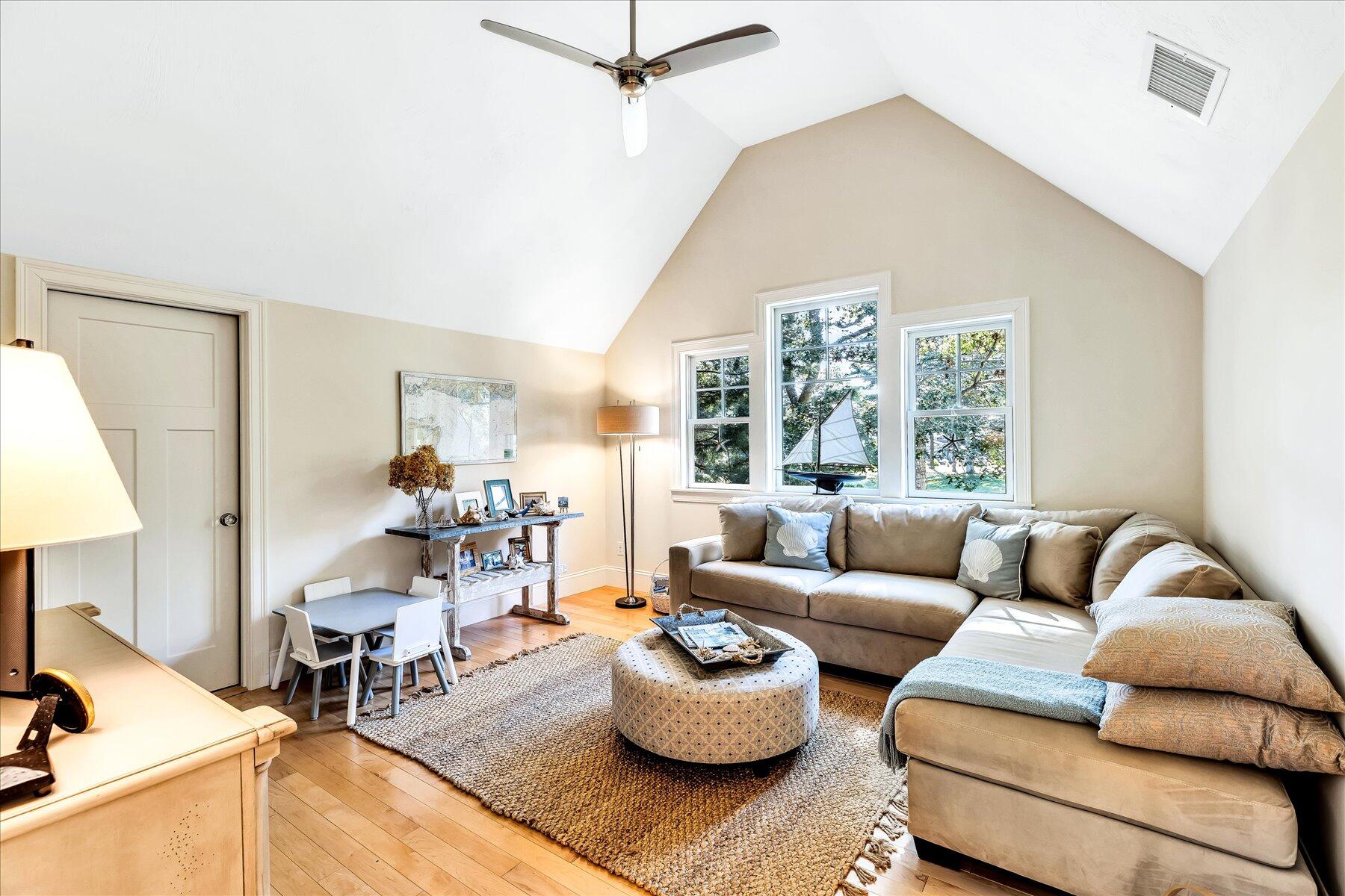 74 The Heights Mashpee, MA 02649 - Photo 24 of 34 a living room with furniture and a large window