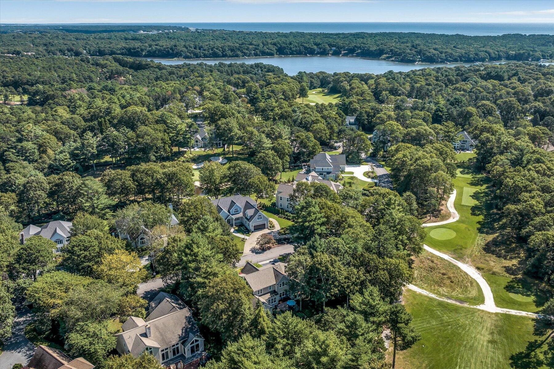 74 The Heights Mashpee, MA 02649 - Photo 34 of 34 an aerial view of a houses with outdoor space and trees