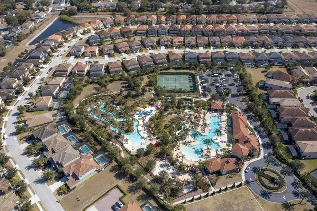 a bathroom with a sink a toilet a shower and a mirror
