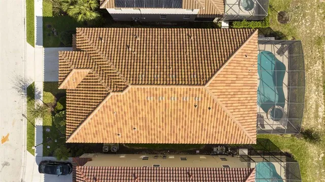 a bedroom with a bed and a night stand