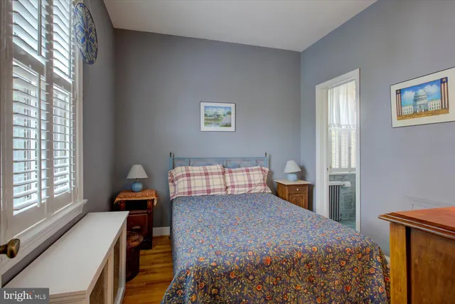 a view of a chairs and tables on the roof deck