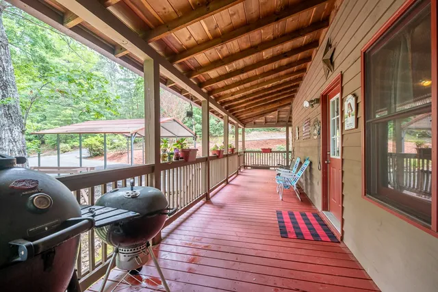 a balcony with wooden floor