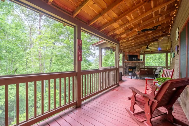 a view of a patio with wooden floor