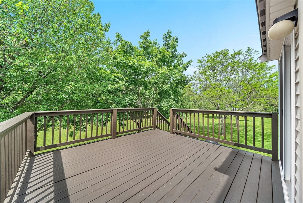 83 Jefferson Road Franklin, MA 02038 - Photo 25 of 34 a view of balcony with wooden floor and fence