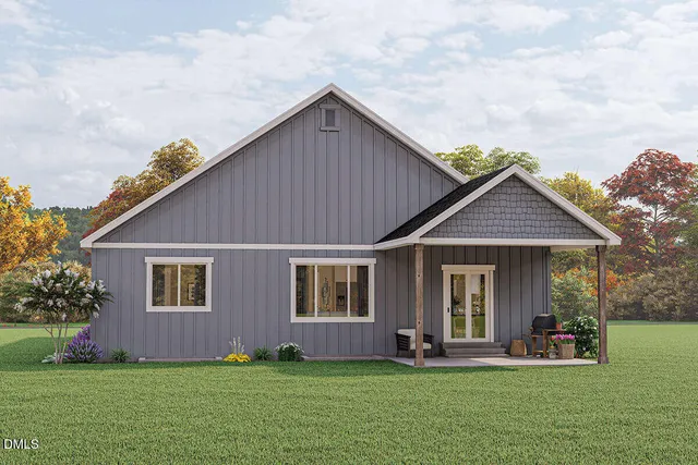 a front view of a house with garage