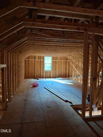 a view of empty room with windows