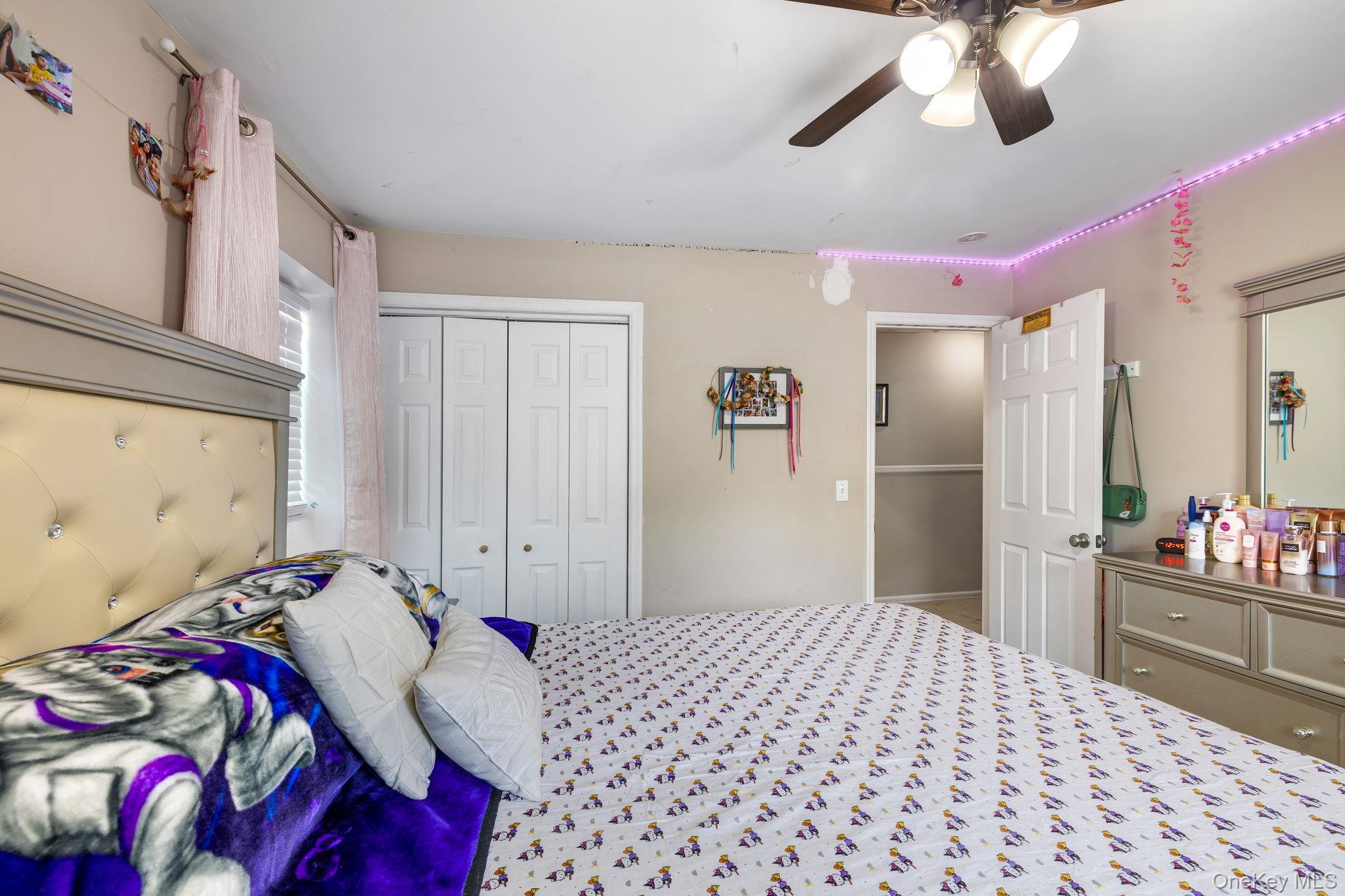 6 Farmstead Road New Windsor, NY 12553 - Photo 21 of 32 Bedroom featuring a closet and a ceiling fan