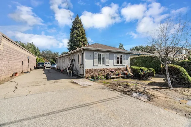 a view of a street with parking