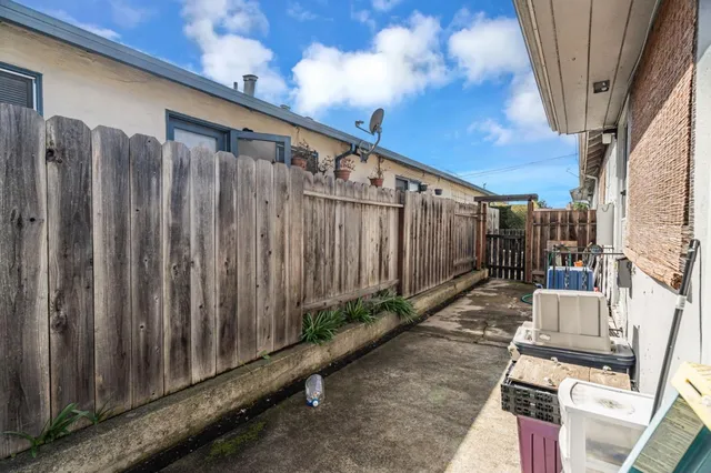 a view of a back yard of the house
