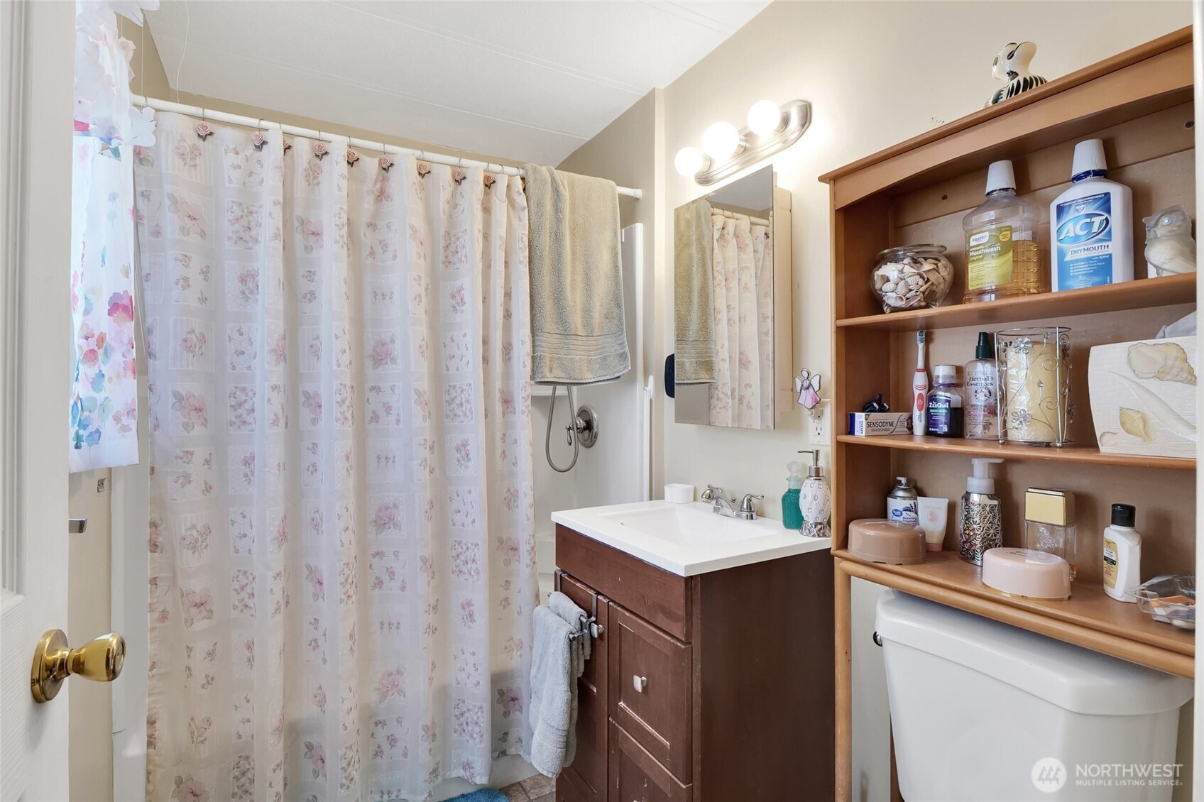 9630 Rd H.8 Northeast Moses Lake, WA 98837 - Photo 20 of 39 a bathroom with a sink vanity and a mirror