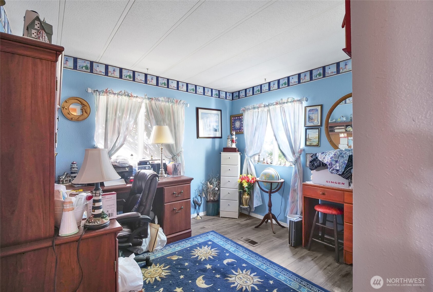 9630 Rd H.8 Northeast Moses Lake, WA 98837 - Photo 21 of 39 a bedroom with furniture and a window