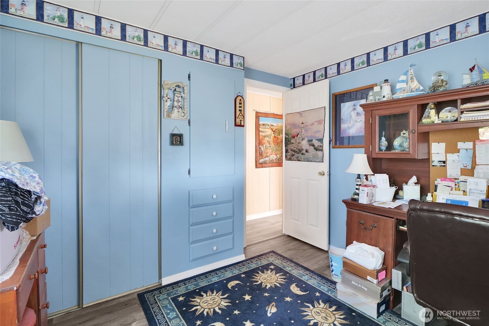 9630 Rd H.8 Northeast Moses Lake, WA 98837 - Photo 22 of 39 a room with cabinets and wooden floor