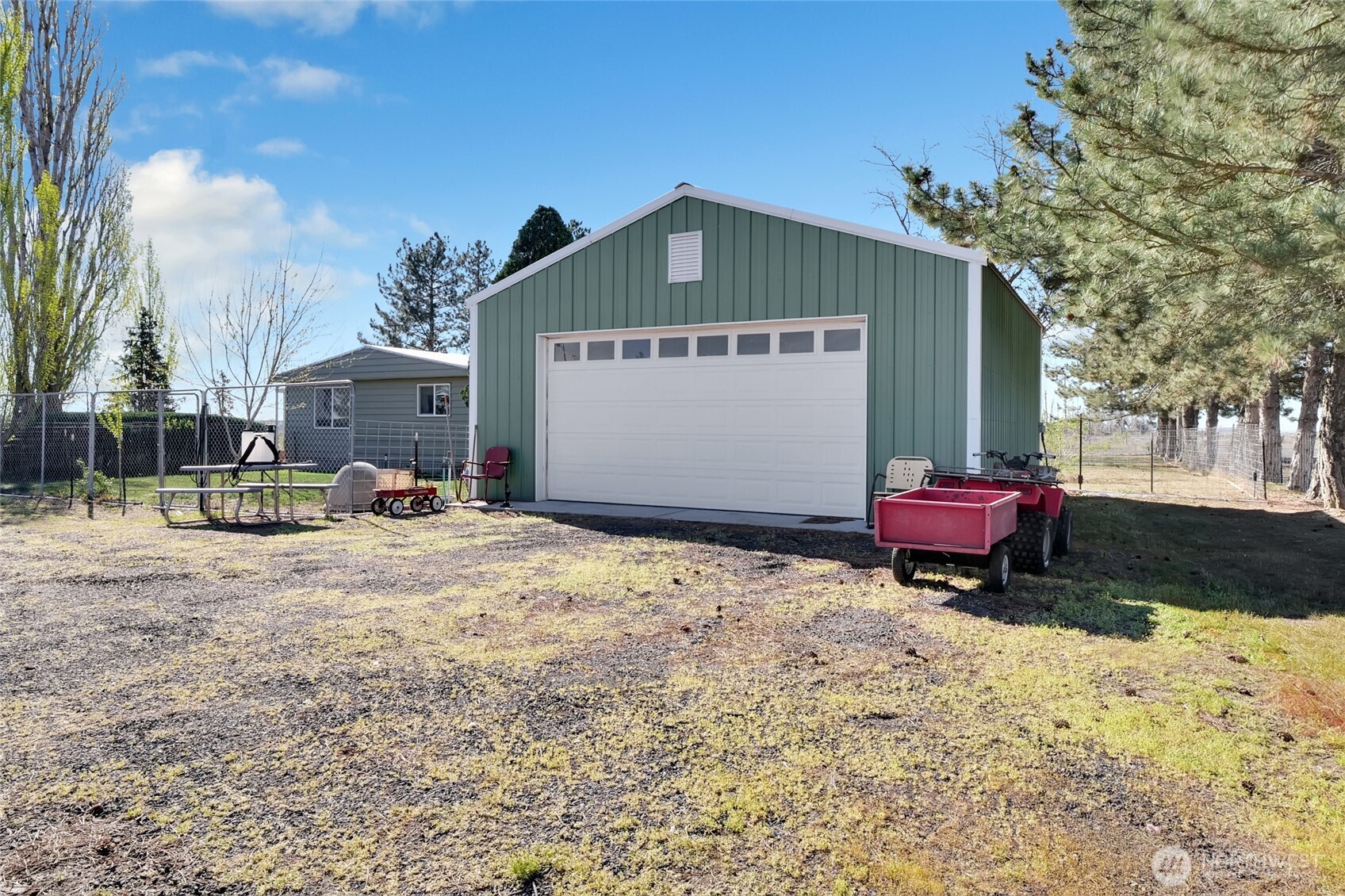 9630 Rd H.8 Northeast Moses Lake, WA 98837 - Photo 30 of 39 a view of a house with a yard and sitting area
