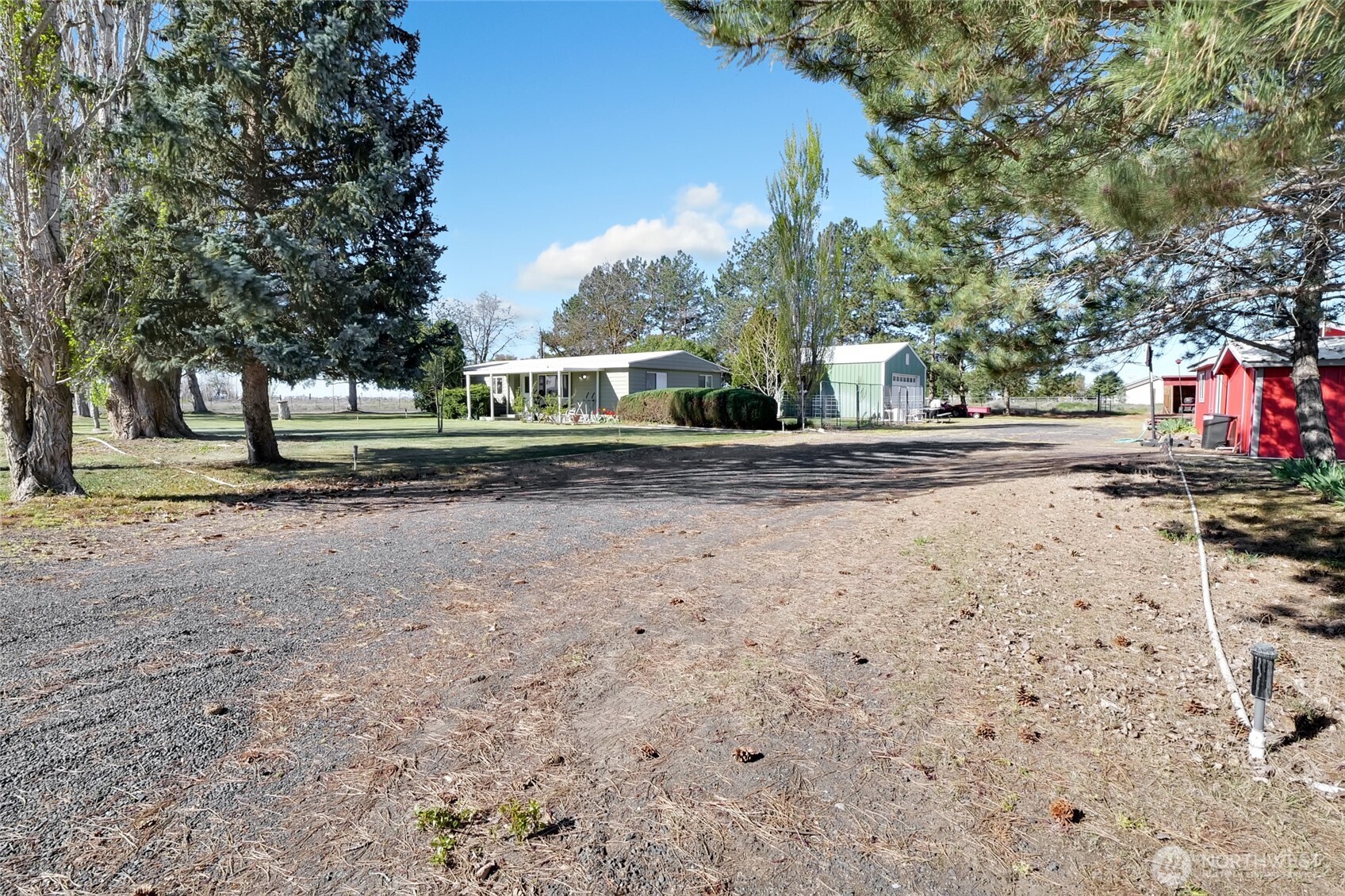 9630 Rd H.8 Northeast Moses Lake, WA 98837 - Photo 3 of 39 a view of street view with trees