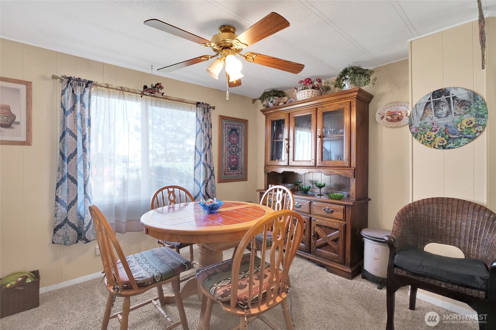 9630 Rd H.8 Northeast Moses Lake, WA 98837 - Photo 9 of 39 a dining room with furniture and window