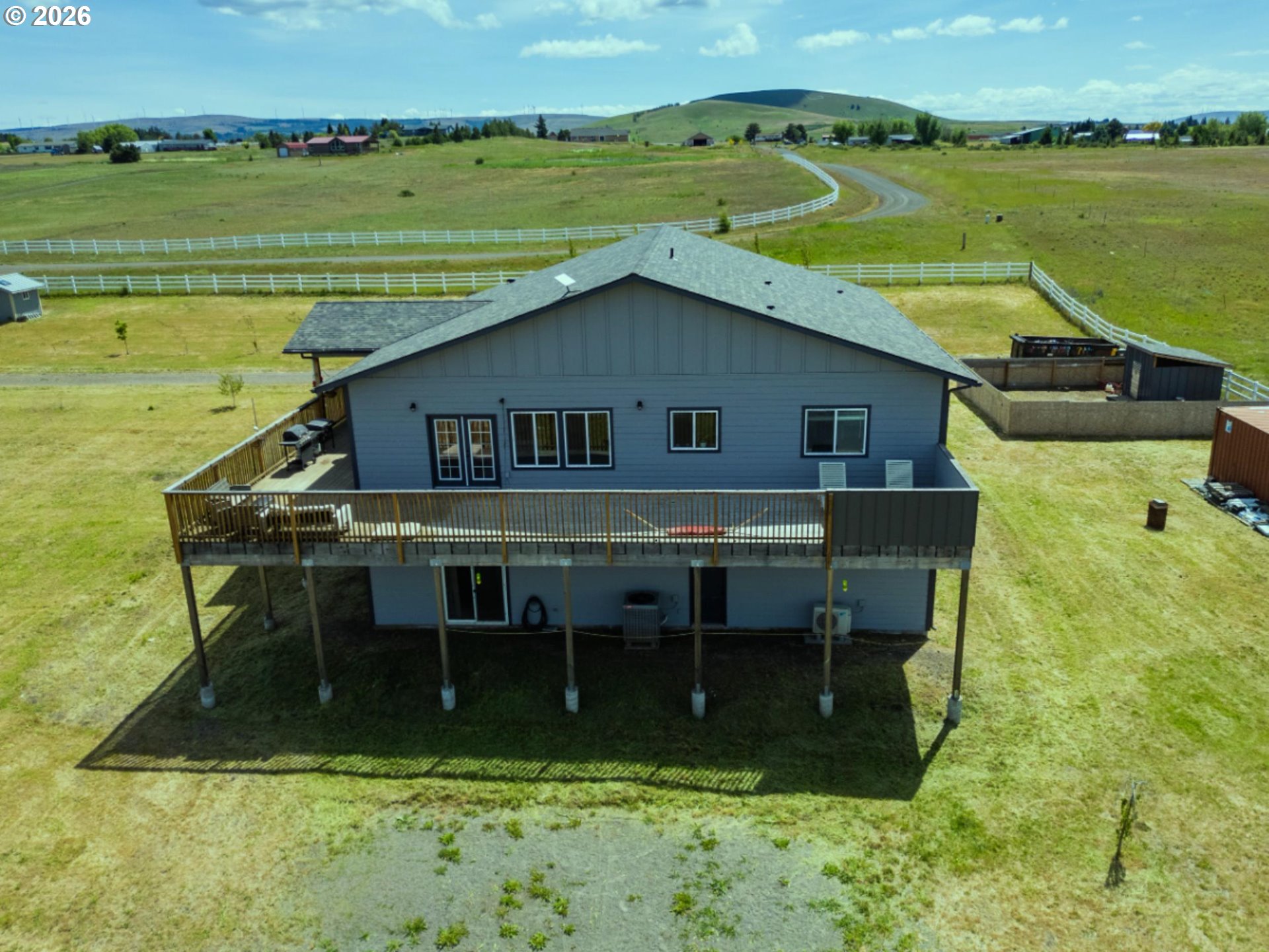 19 Inverness Road Goldendale, WA 98620 - Photo 6 of 48 a view of a house with a yard and a table