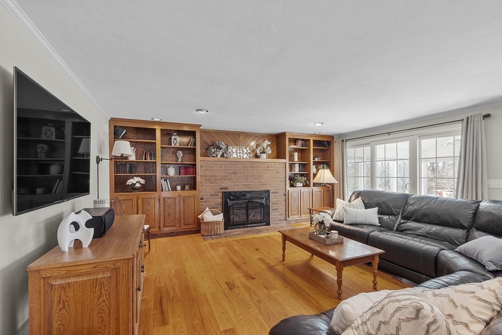 2 Abigail Drive Hudson, MA 01749 - Photo 21 of 42 a living room with furniture and a fireplace
