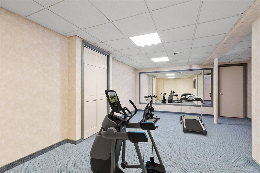 2 Abigail Drive Hudson, MA 01749 - Photo 35 of 42 a view of a room with gym equipment