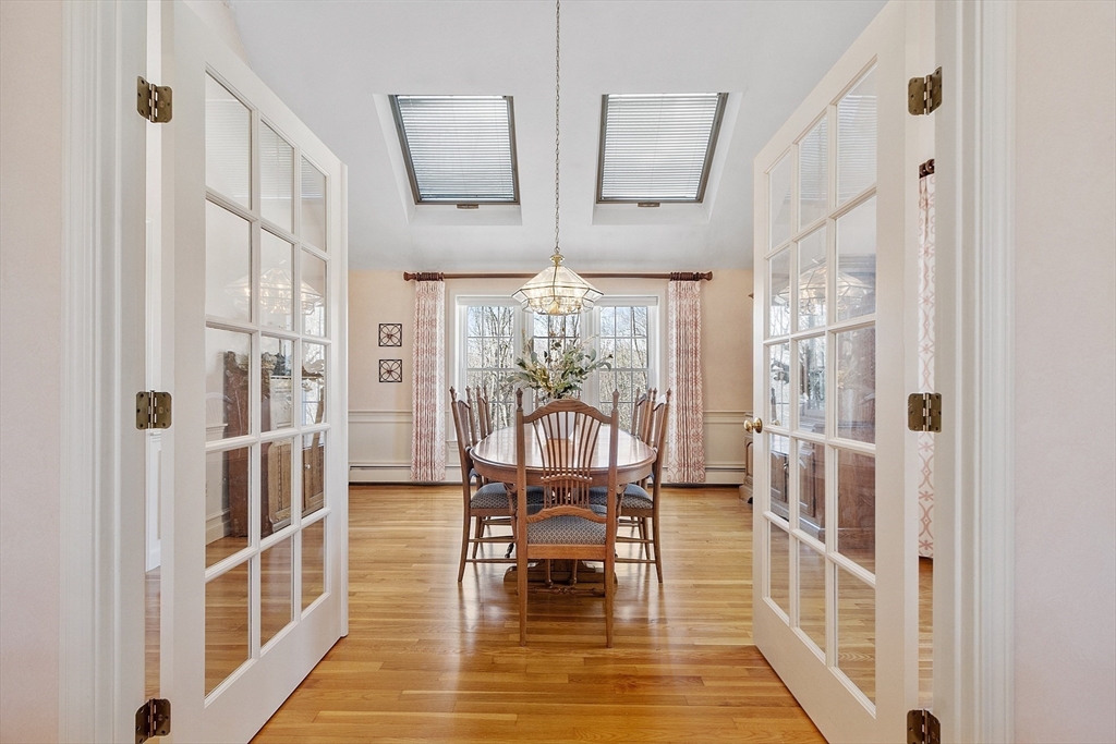 2 Abigail Drive Hudson, MA 01749 - Photo 9 of 42 a view of a dining room with furniture window and wooden floor