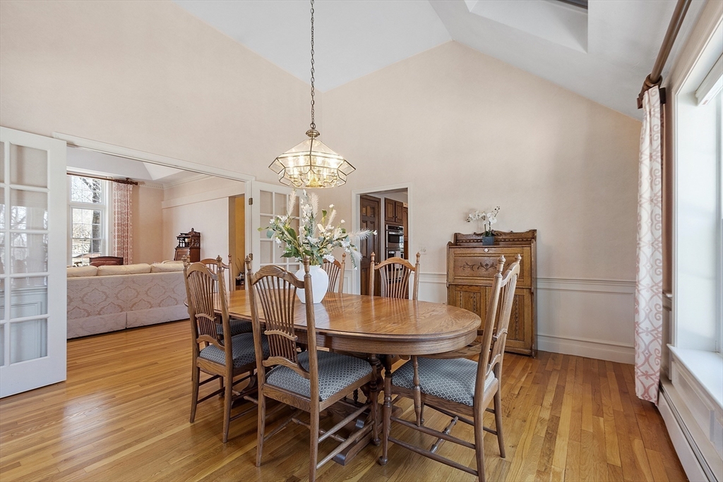 2 Abigail Drive Hudson, MA 01749 - Photo 10 of 42 a view of a dining room with furniture a chandelier and wooden floor