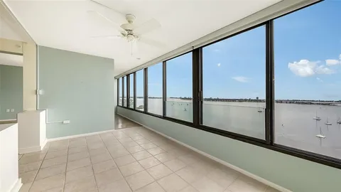 a view of a hallway with windows