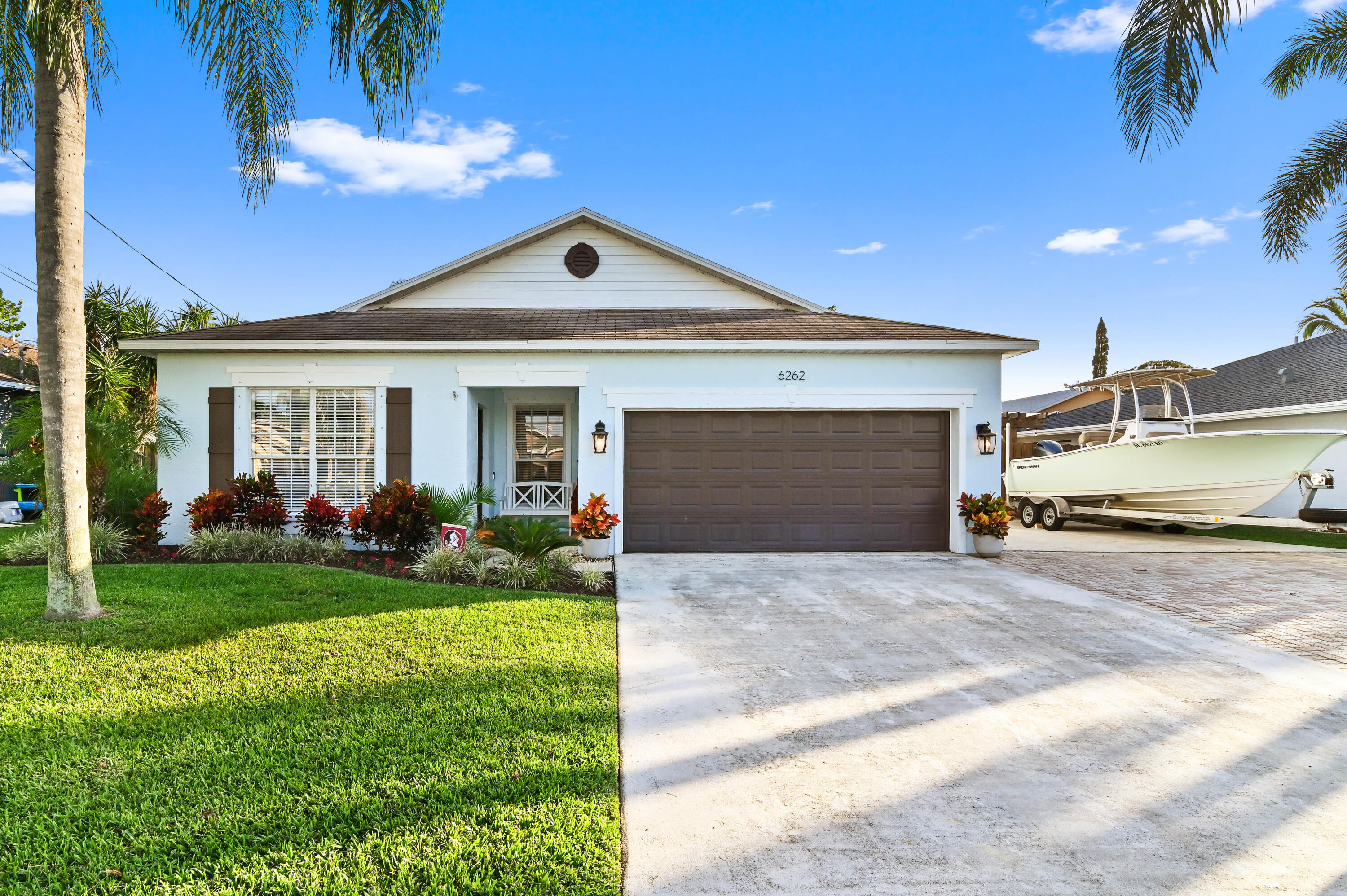 6262 Drake Street Jupiter, FL 33458 - Photo 1 of 33 01 front 01