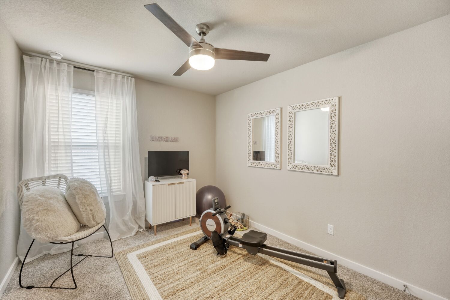 200 Coda Crossing Georgetown, TX 78633 - Photo 12 of 29 a workspace with wooden floor and a window