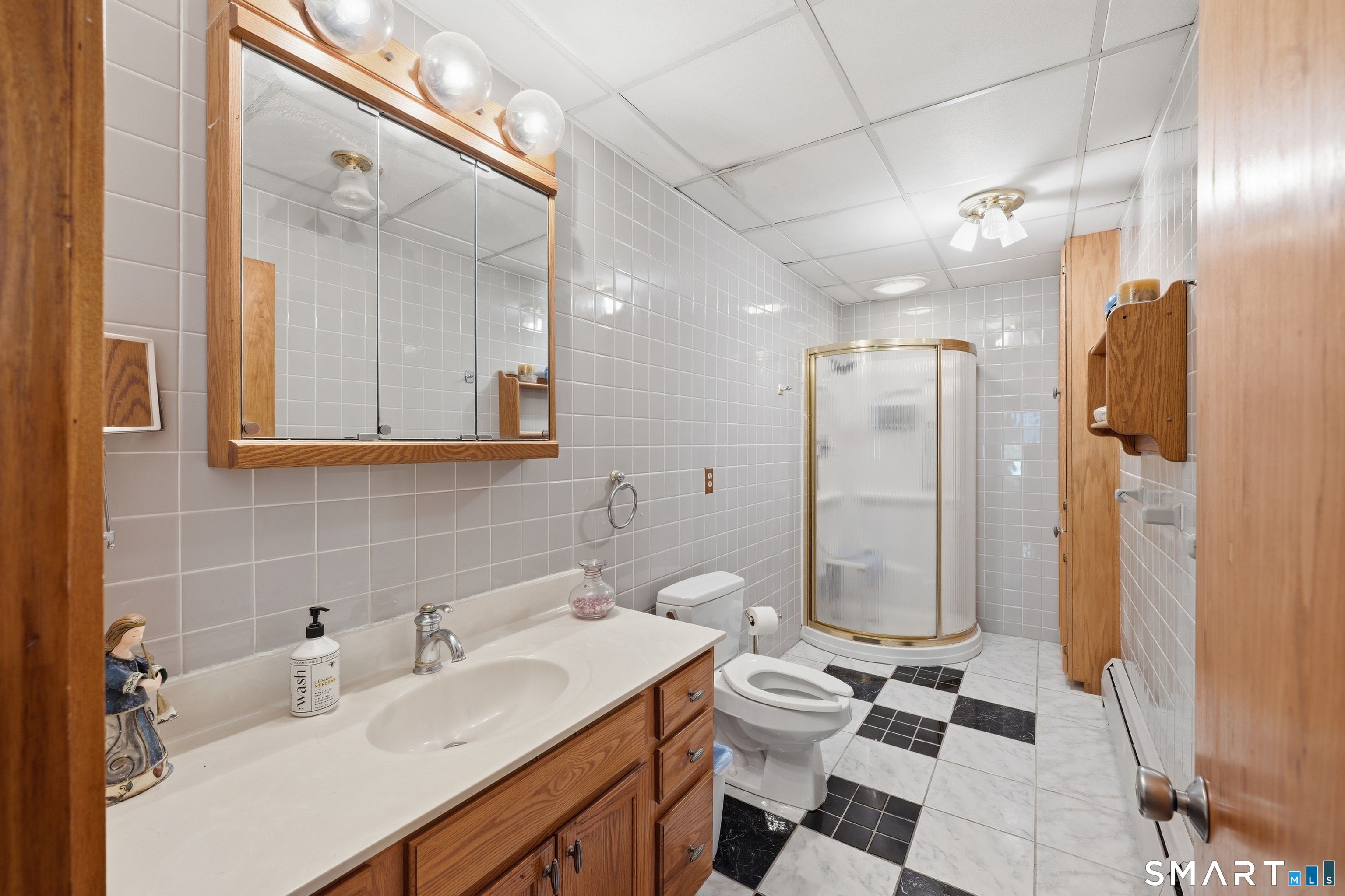 345 Rimmon Road Woodbridge, CT 06525 - Photo 12 of 40 First floor full bathroom #1