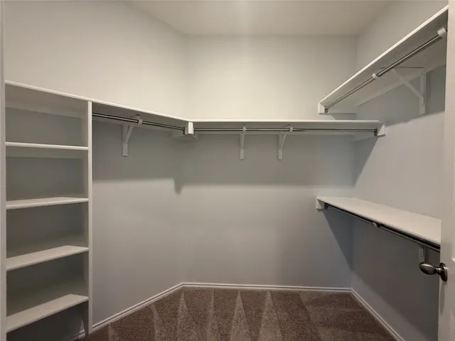 a bathroom with a sink vanity and a mirror