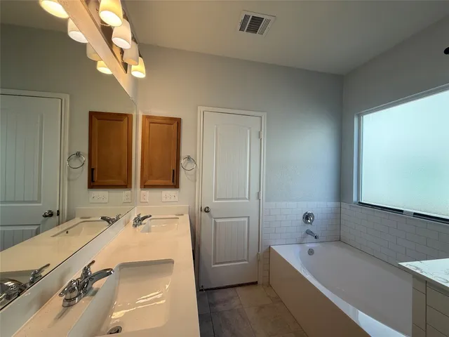 a view of a hallway view with staircase