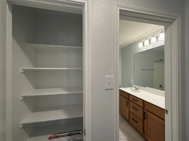 a bathroom with a sink and a bathtub