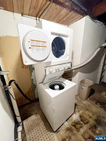 a utility room with a sink a washer and dryer