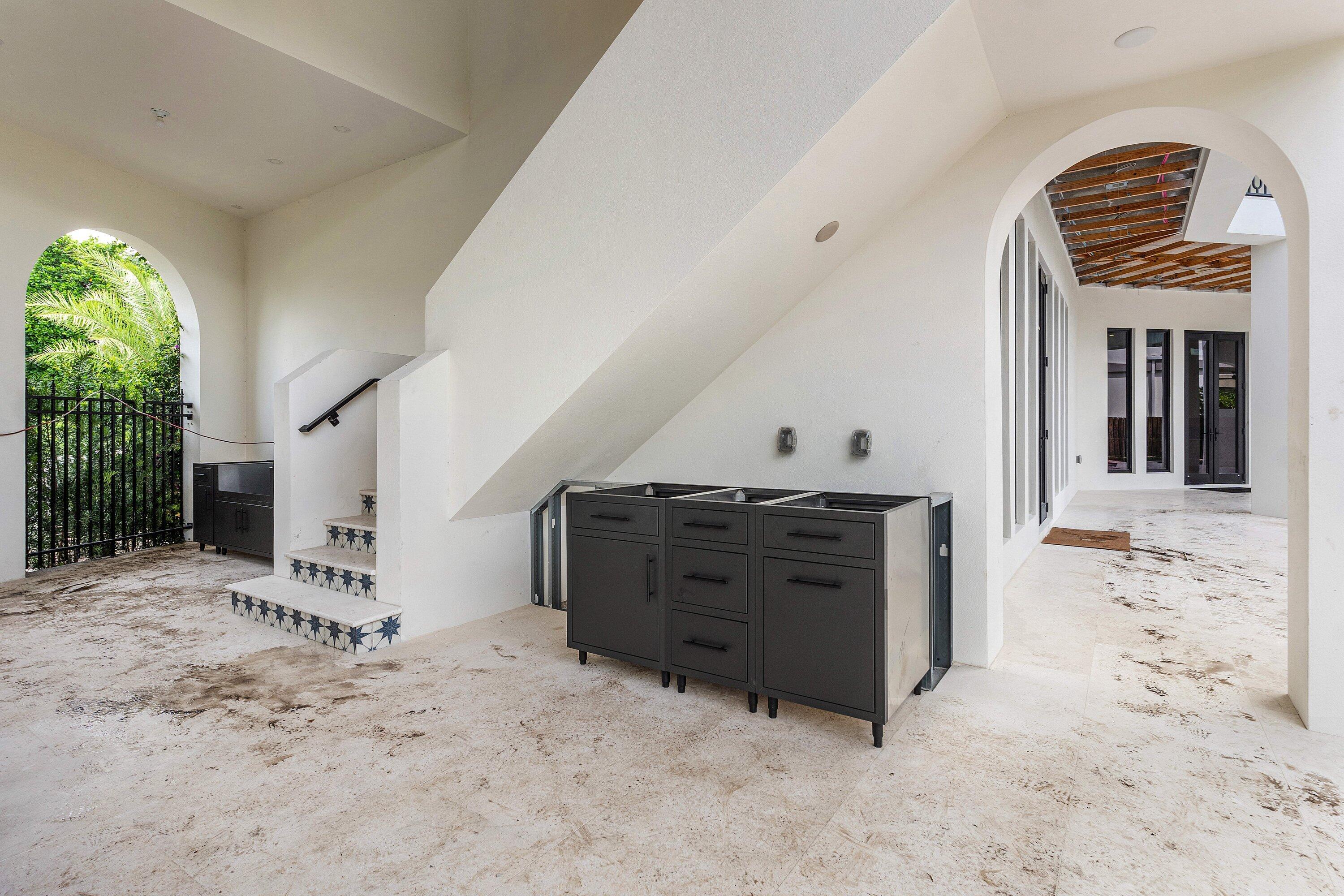 298 Northeast 8th Street Boca Raton, FL 33432 - Photo 55 of 86 a view of a hallway with entryway