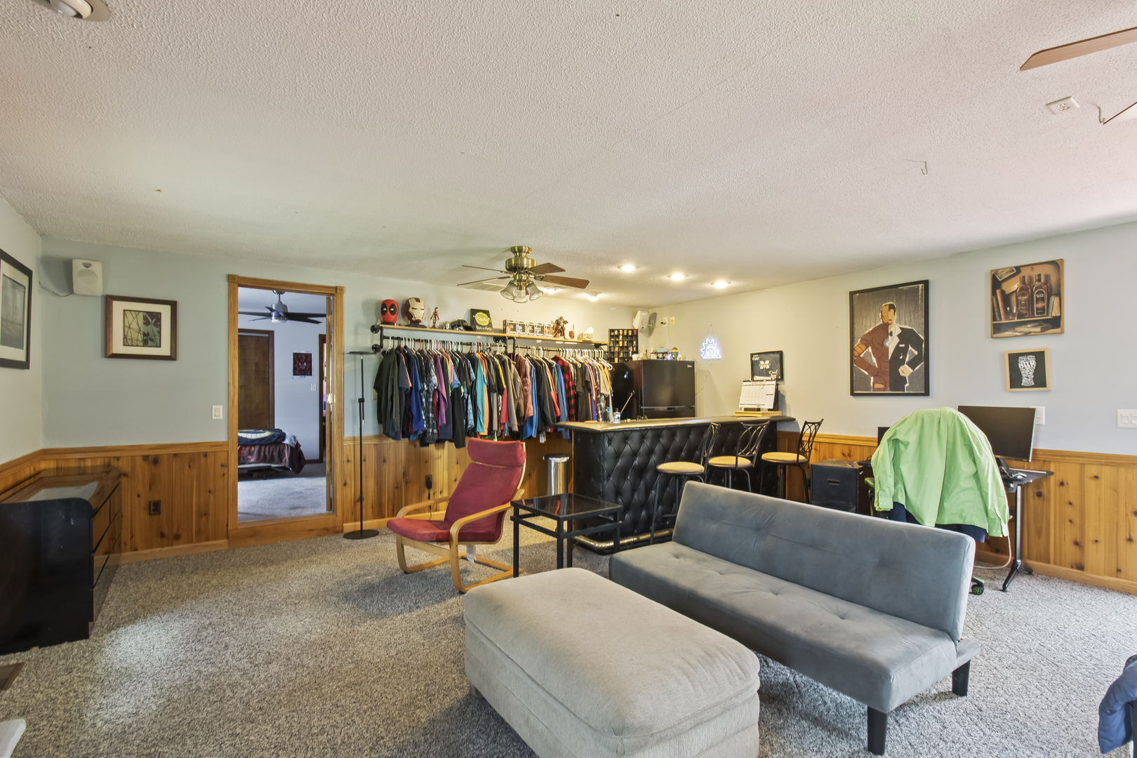 812 West 3rd Street Gilman, IL 60938 - Photo 13 of 19 a living room with furniture and a flat screen tv